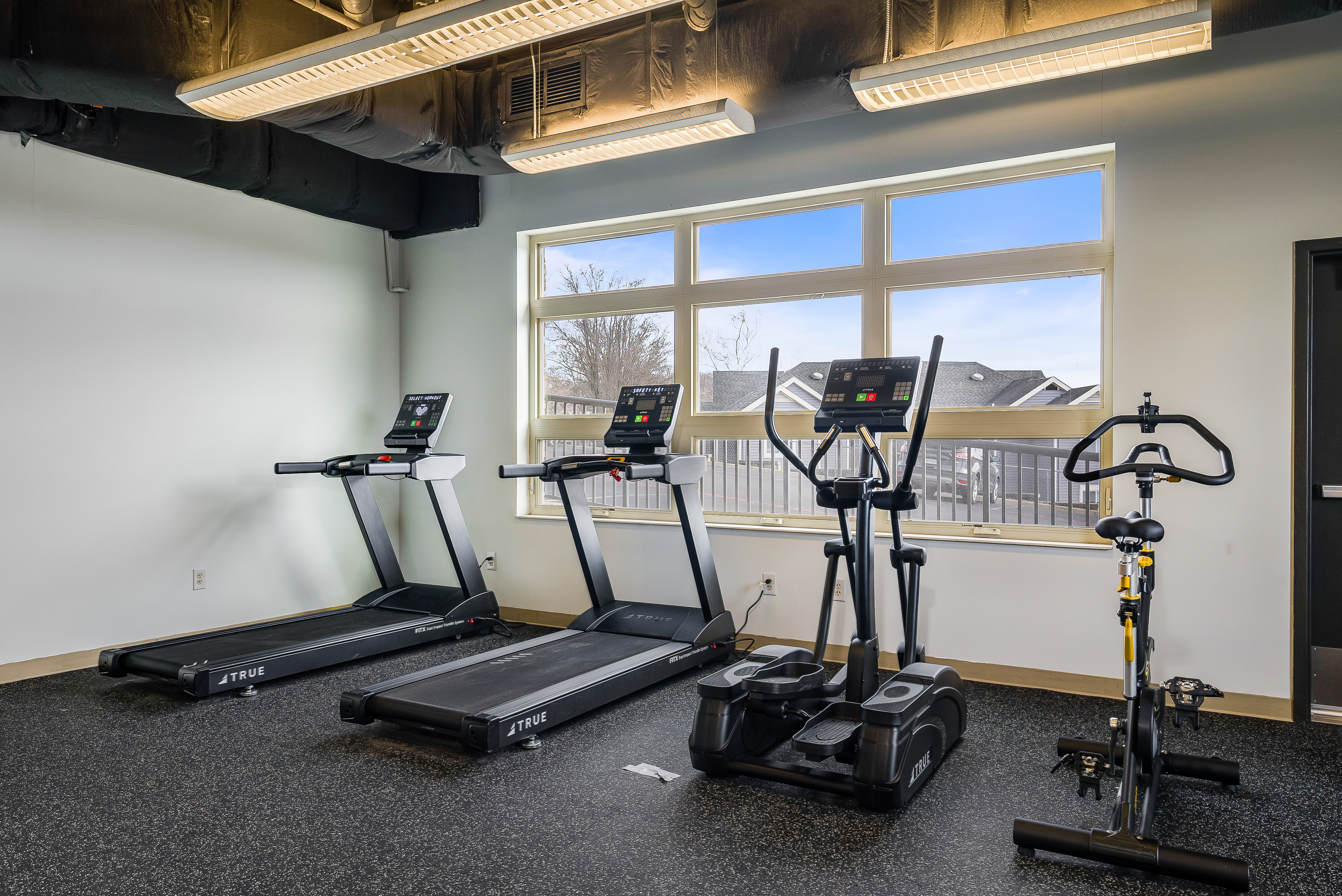 Fitness center cardio section with treadmills