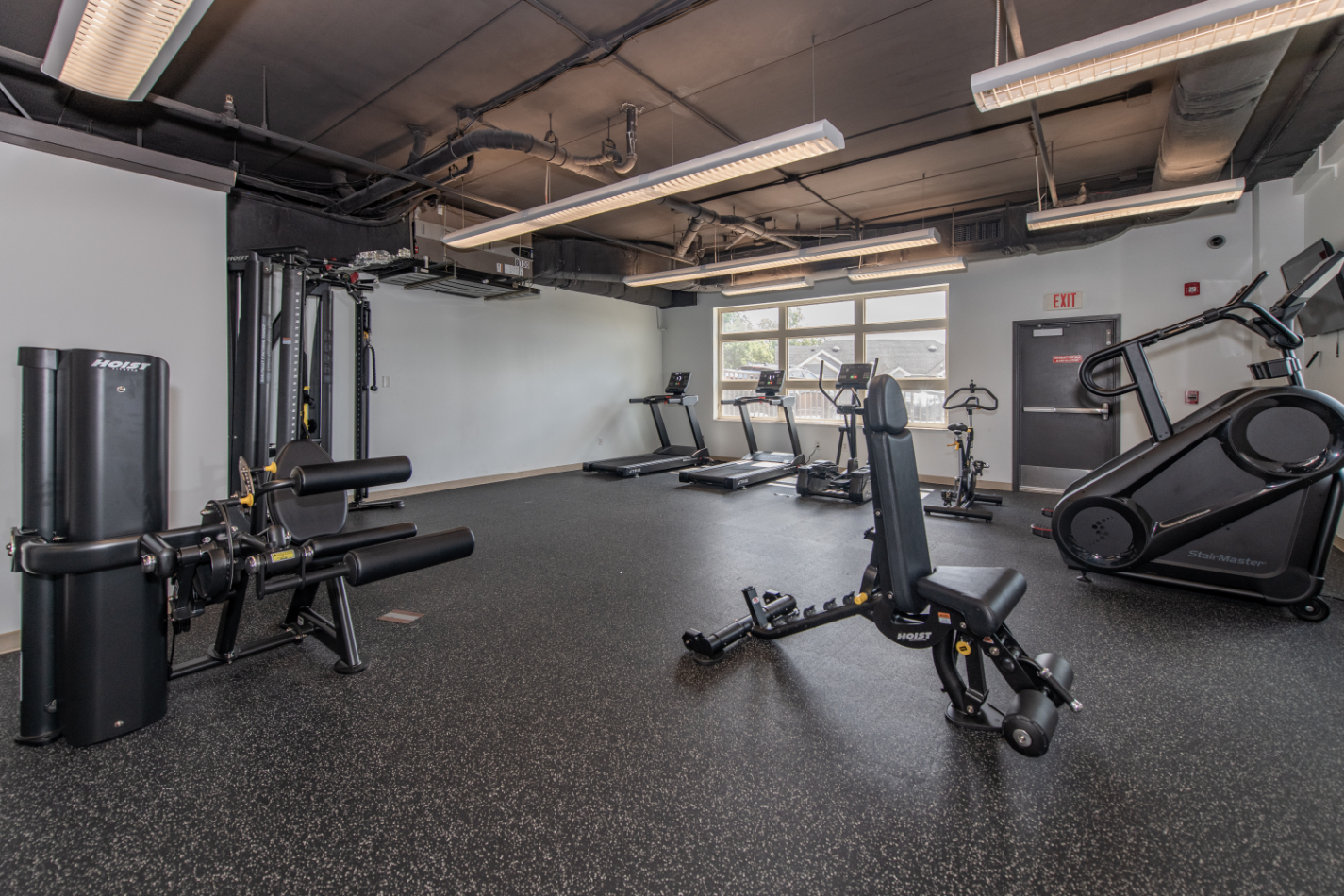 Fitness center with stair master, treadmills and stationary bikes