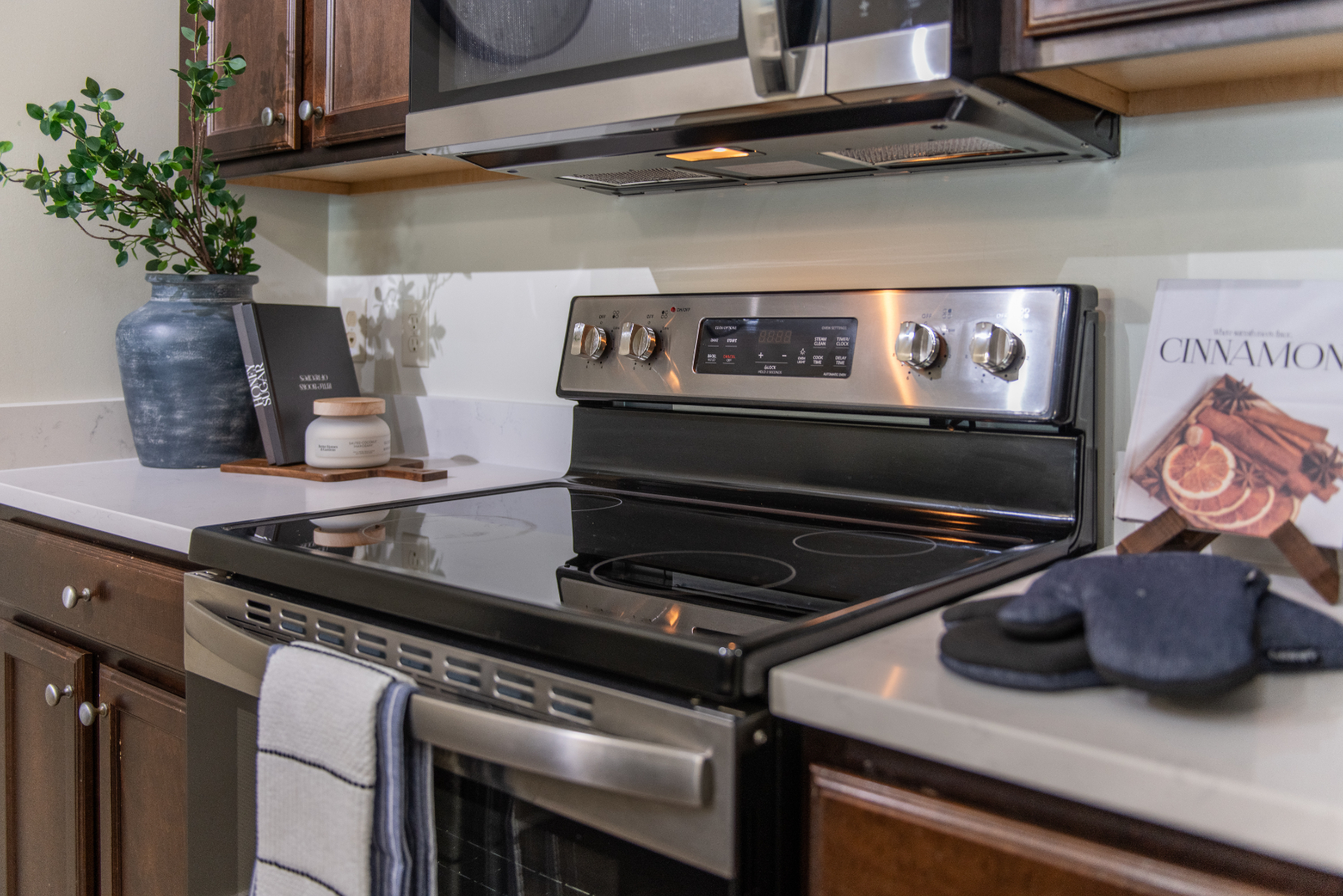 Kitchen with brown cabinets and stainless steel appliances