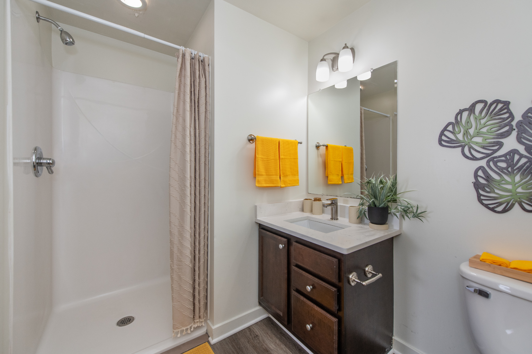 Bathroom with shower and vanity 