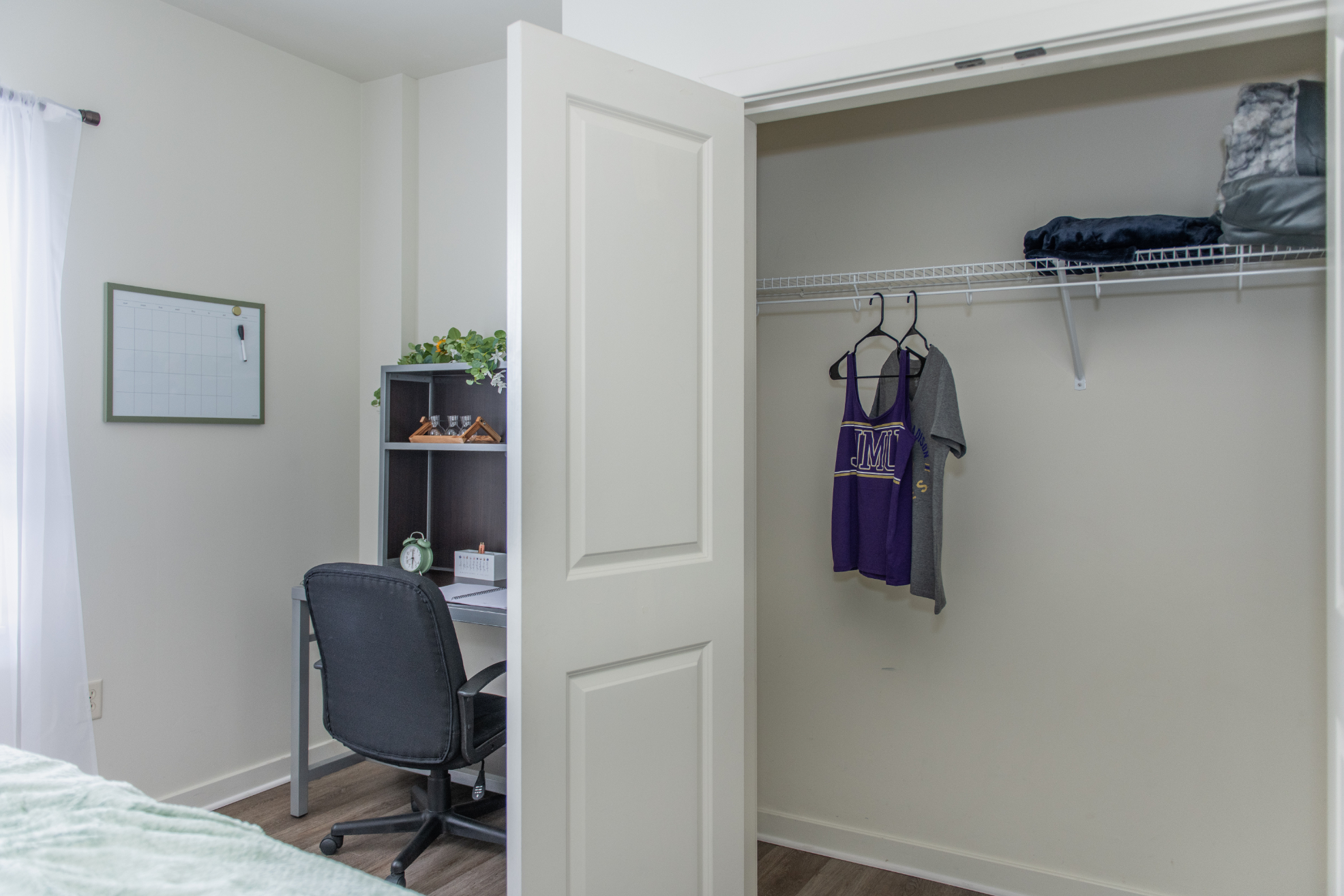 Bedroom closet and desk area