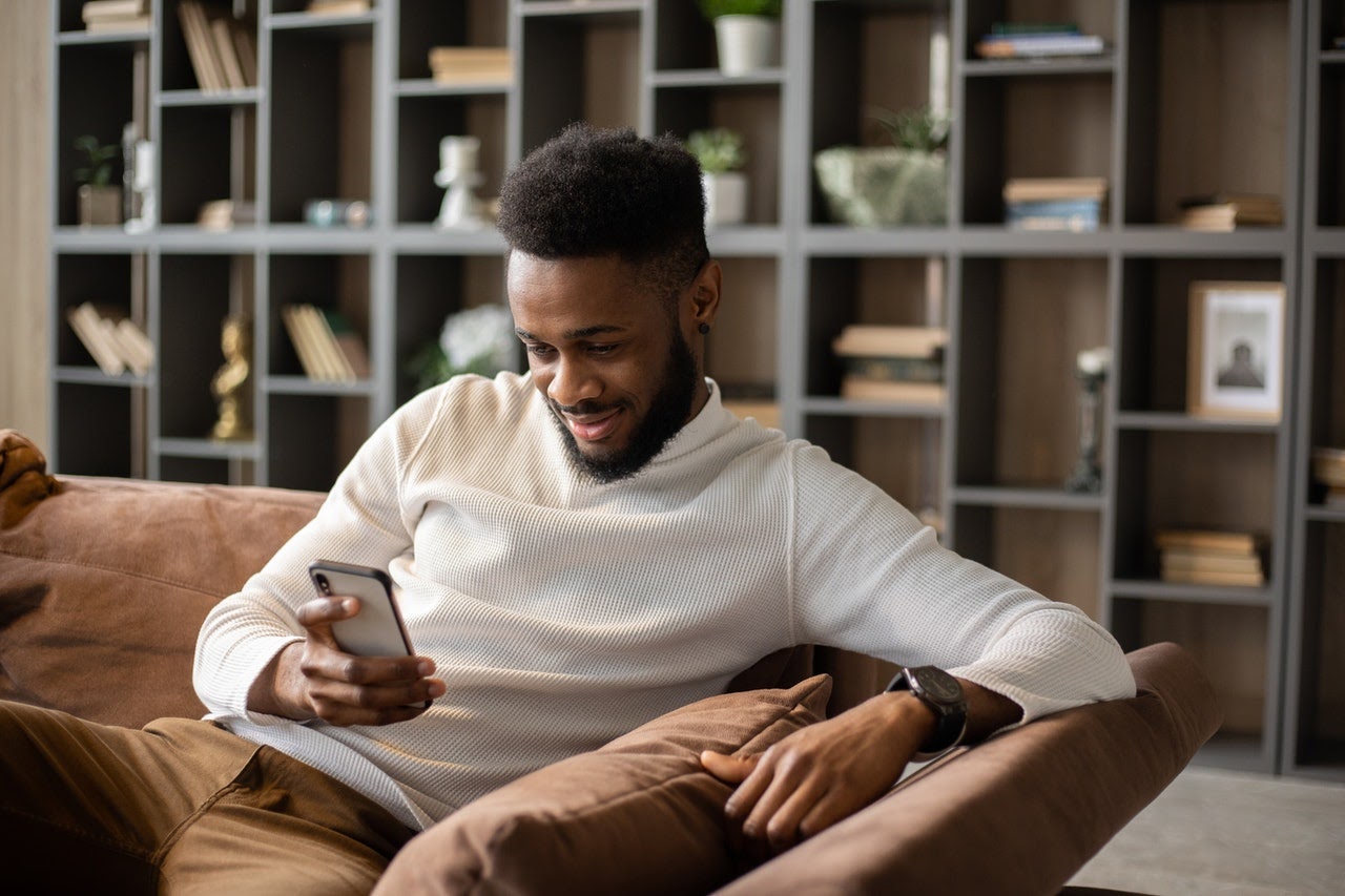a man shopping on his phone