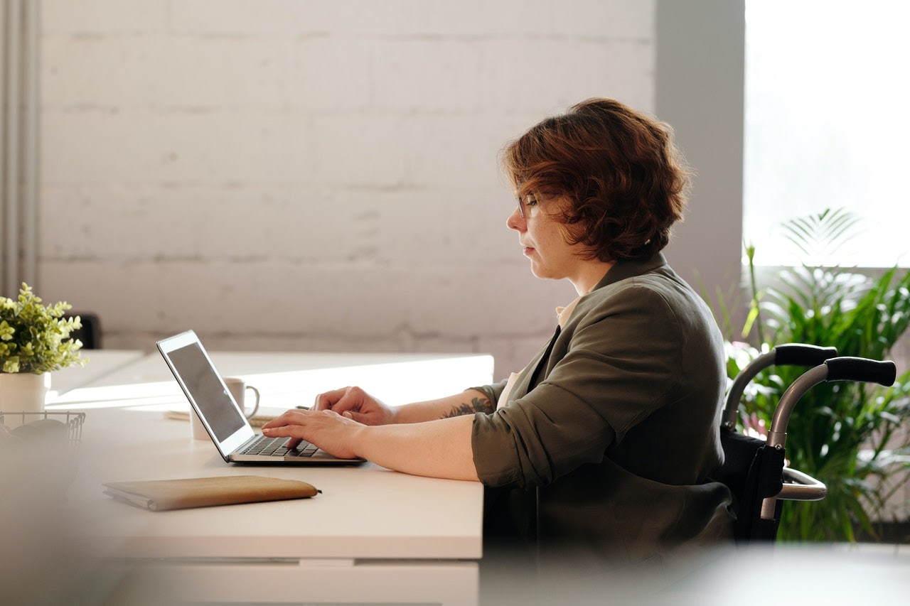 a woman working on her blog