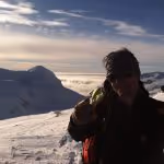 Student Evan psyched to summit Sol mountain.