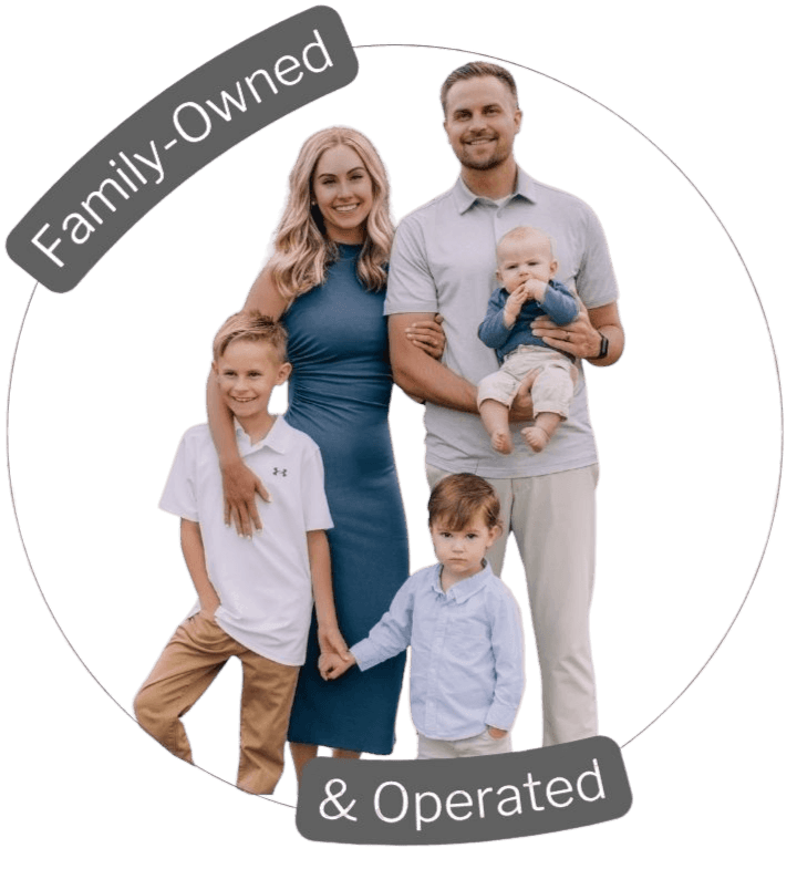 Smiling family of five with two young boys, a baby, and parents standing in a circular frame with text proving they are a family-owned dental practice in Chandler, Arizona.