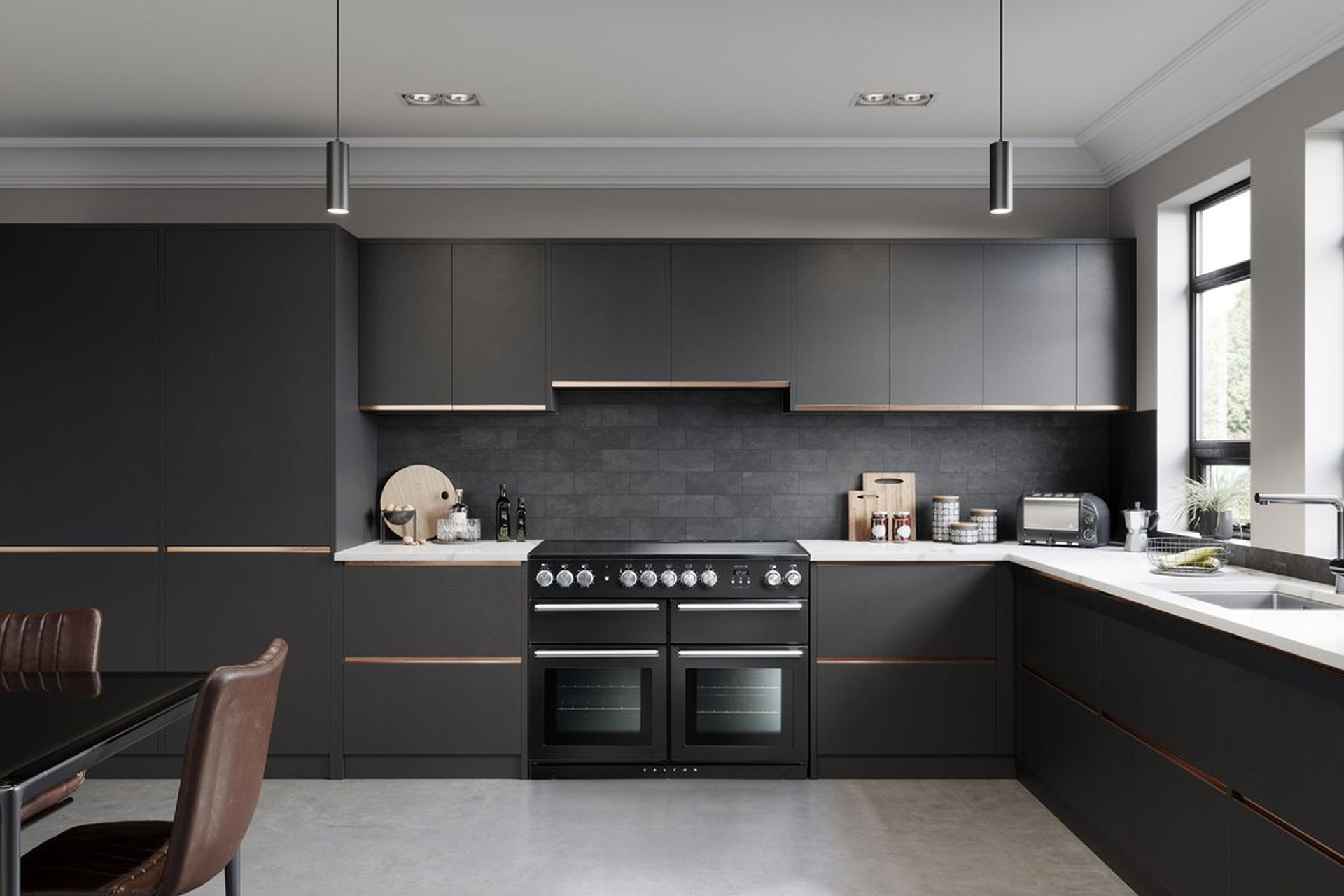Freestanding range cooker and rangehood in a kitchen with dark cabinetry.