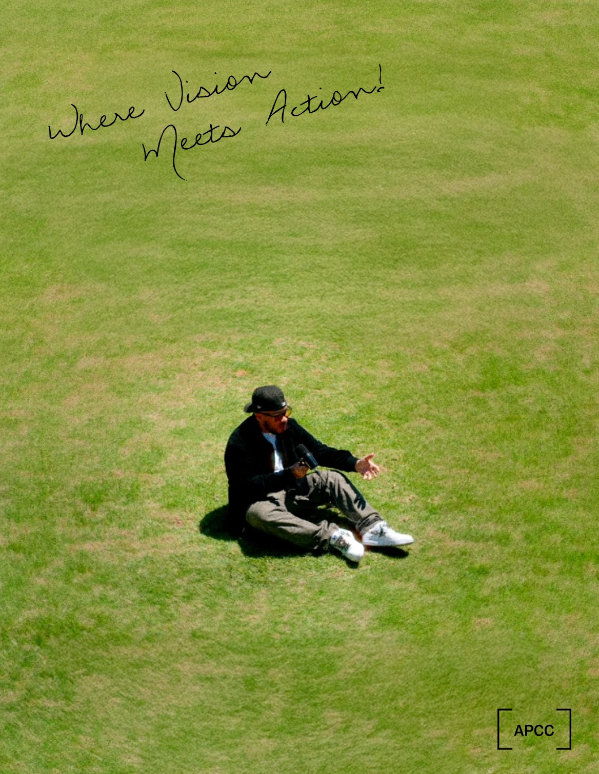 Photo of Adrian Per in a grassy field with the logo and handwritten text reading 'where vision meets action.'