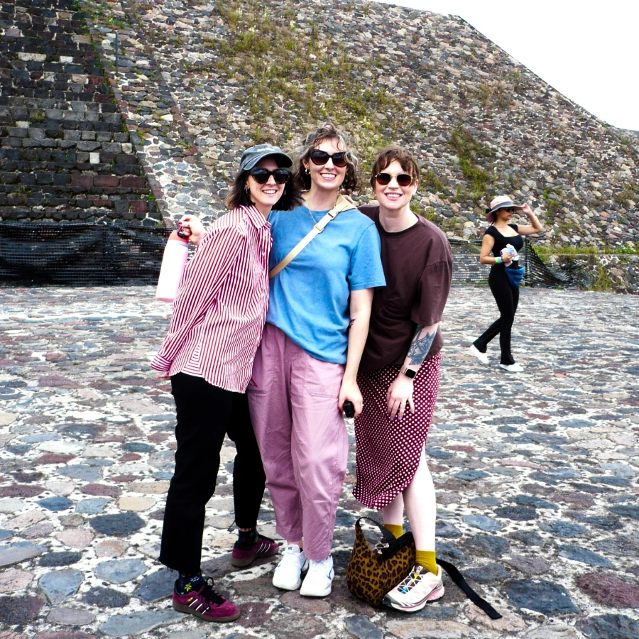 Emmy, Em, and Emily, our team members, pose for a group photo at the Teotihuacan pyramids