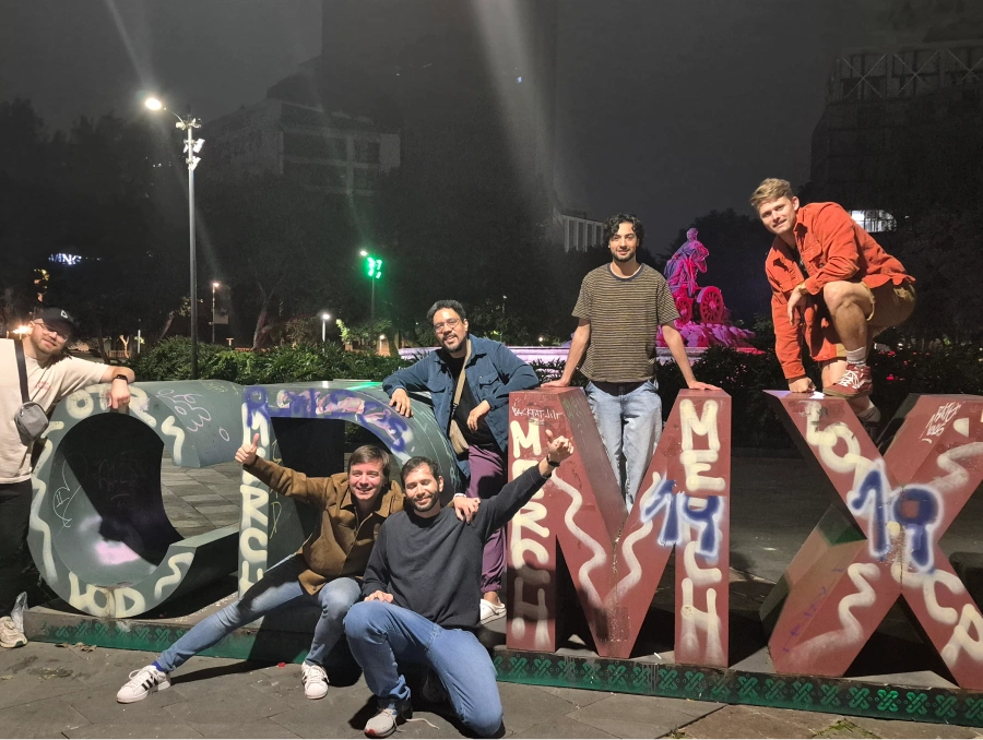Some of our team members on a CDMX sign