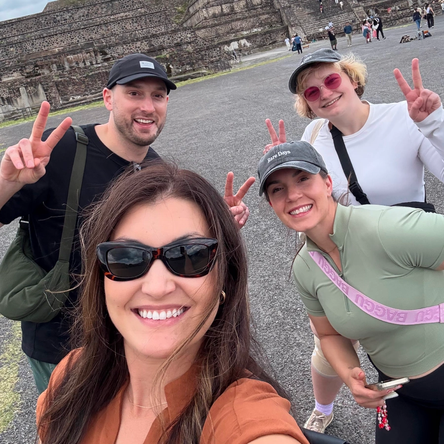 Holden, Chantal, Amanda, and Ash, our team members, smile for a selfie
