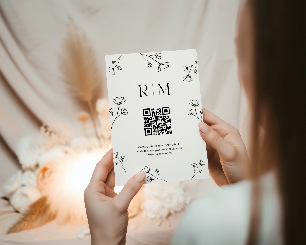 A printed QR code to collect wedding pictures