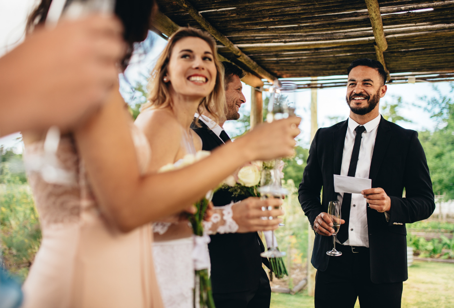 Wedding guests drinking champagne at a wedding.