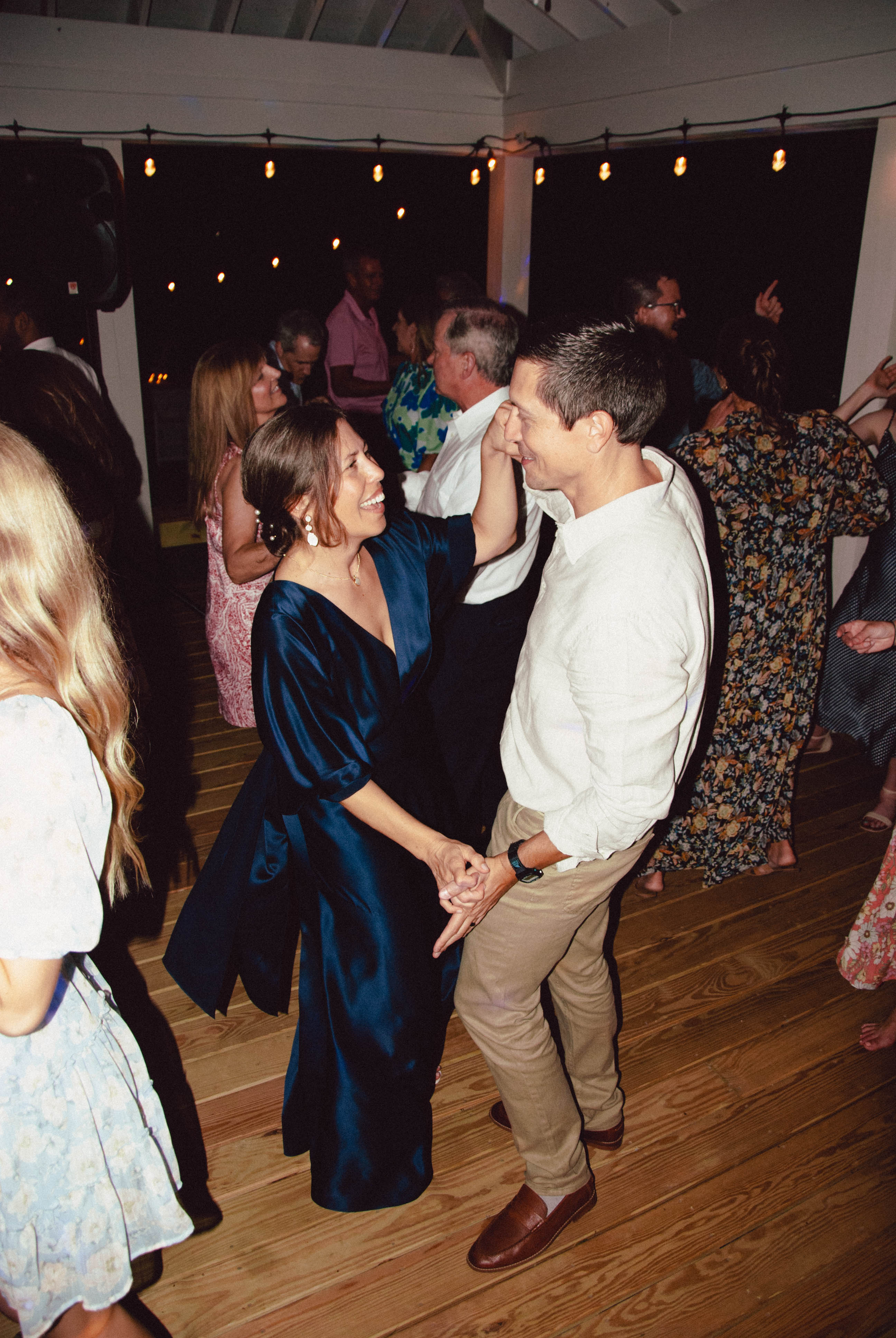 Wedding guests dancing.
