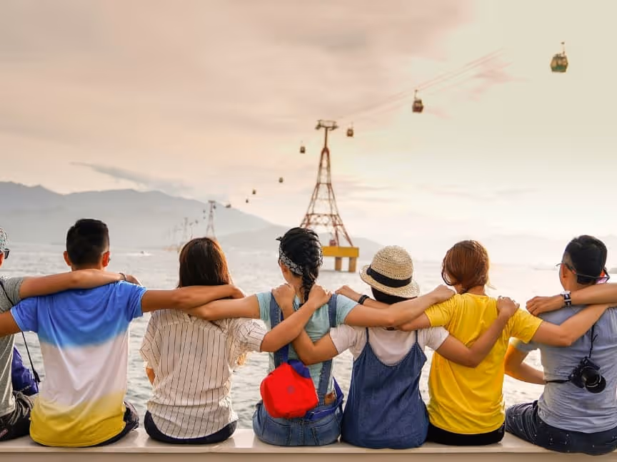 group diverse people sitting down looking at distance. 
