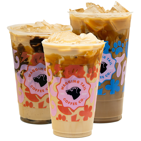 Three iced coffees in branded cups.