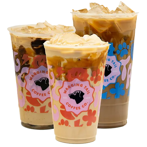 Three iced coffees in branded cups.