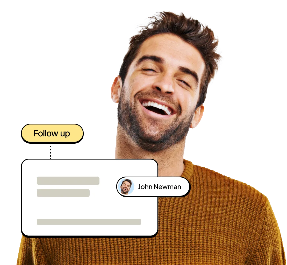 A man smiling with a message bubble above his head.