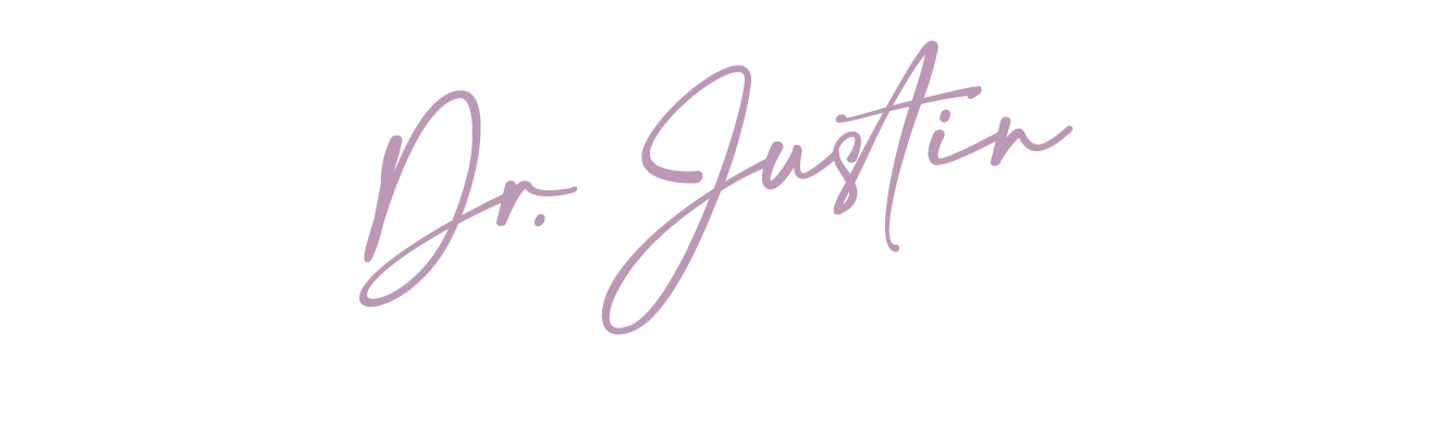 Signature-style text reading 'Dr. Justin' in a light purple color on a white background.