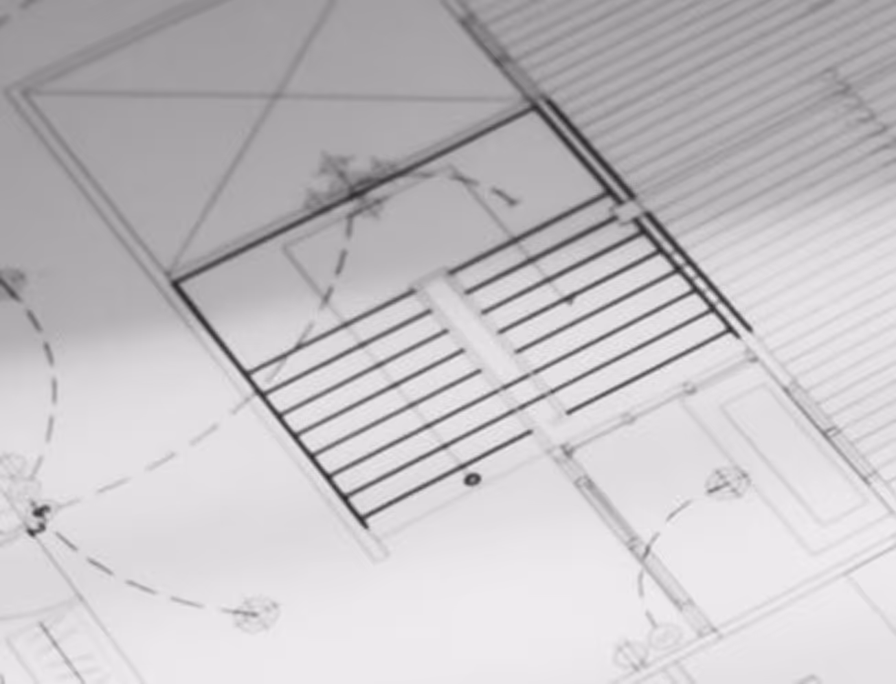 Close-up of a technical architectural blueprint with detailed structural lines and measurements.