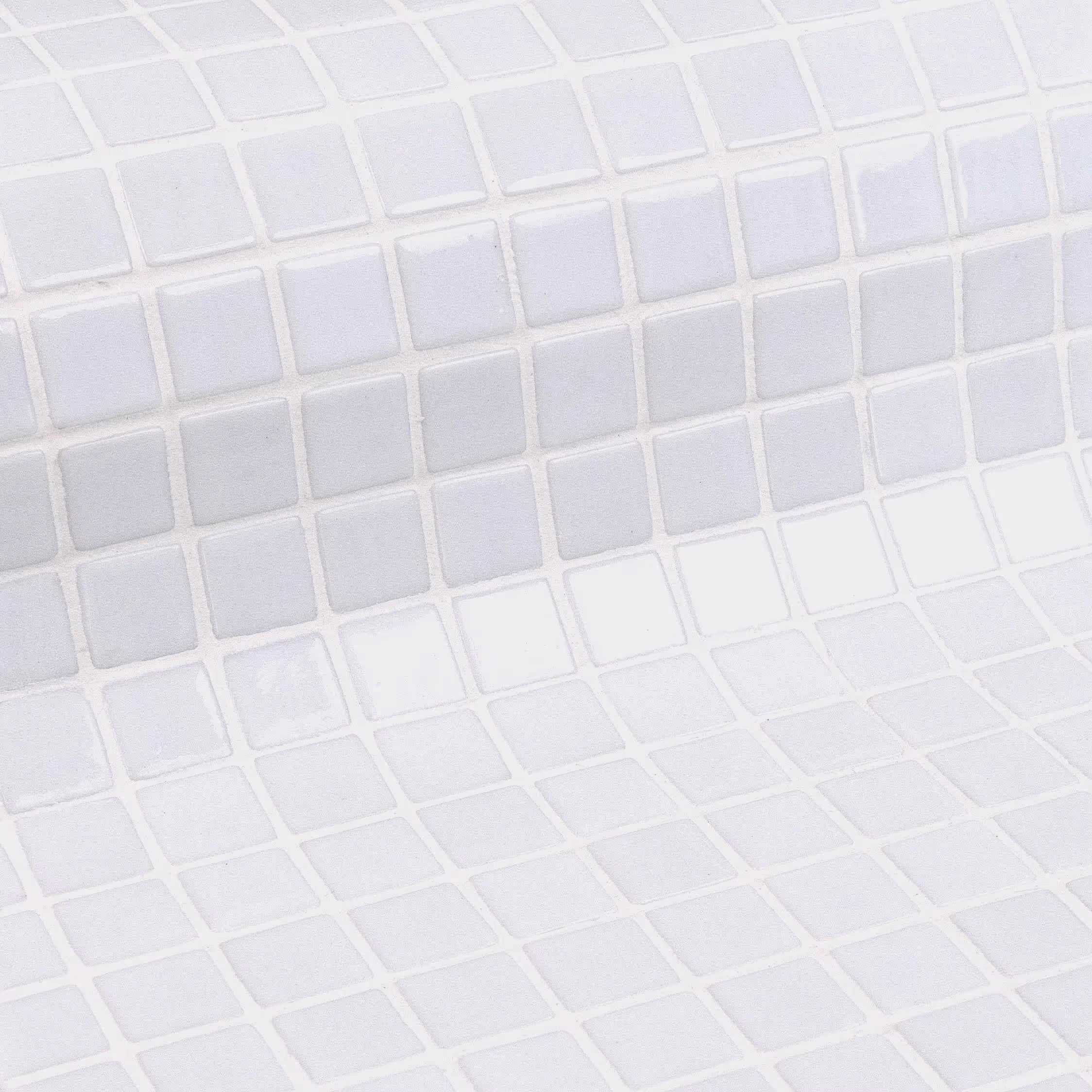 Close-up of light grey and white square tiles arranged in a grid pattern with subtle color variations.