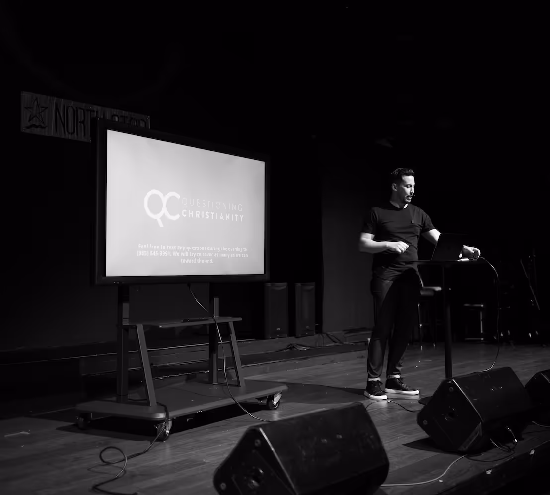 Pastor Rob Russell speaking at the Questioning Christianity event on the topic of God and suffering at Restoration Community Church in Mandeville