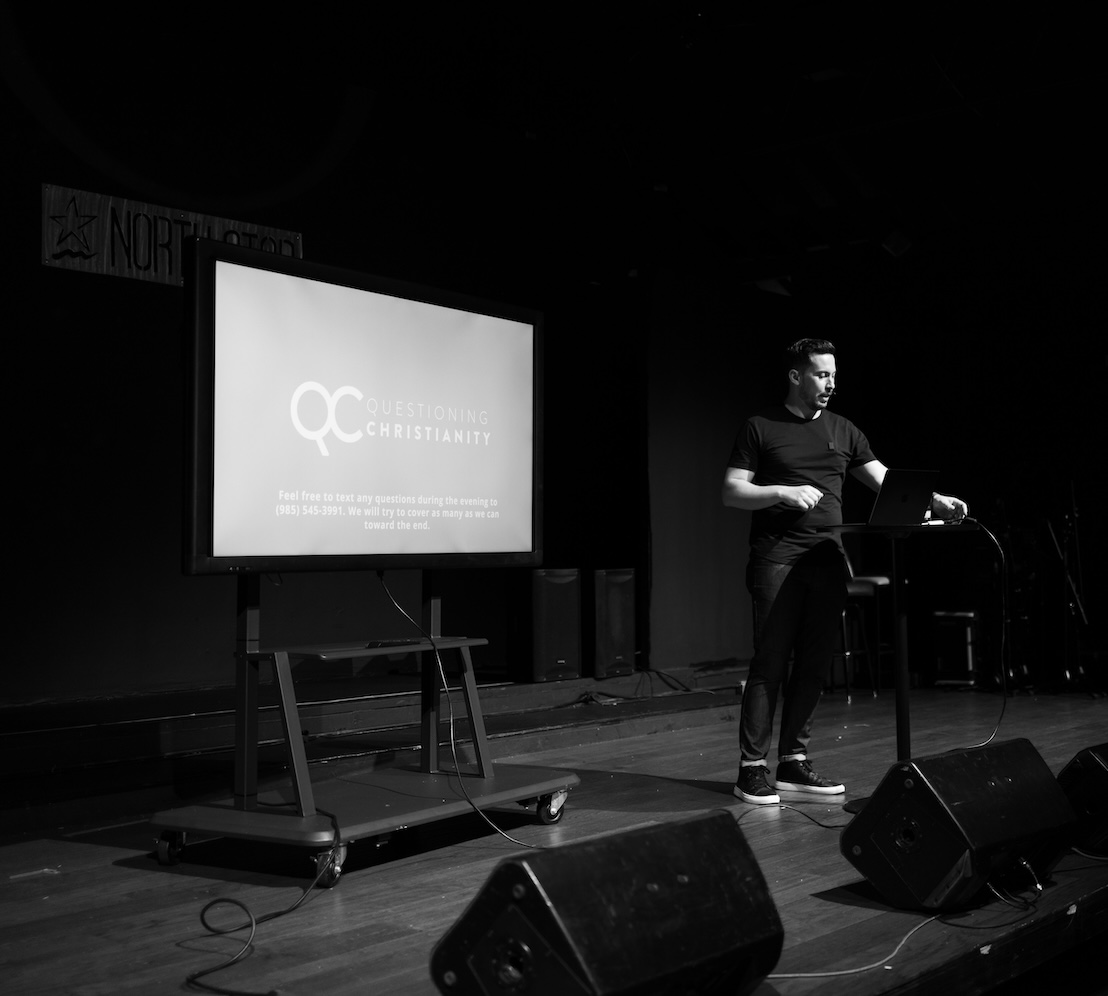 Pastor Rob Russell speaking at the Questioning Christianity event on the topic of God and suffering at Restoration Community Church in Mandeville