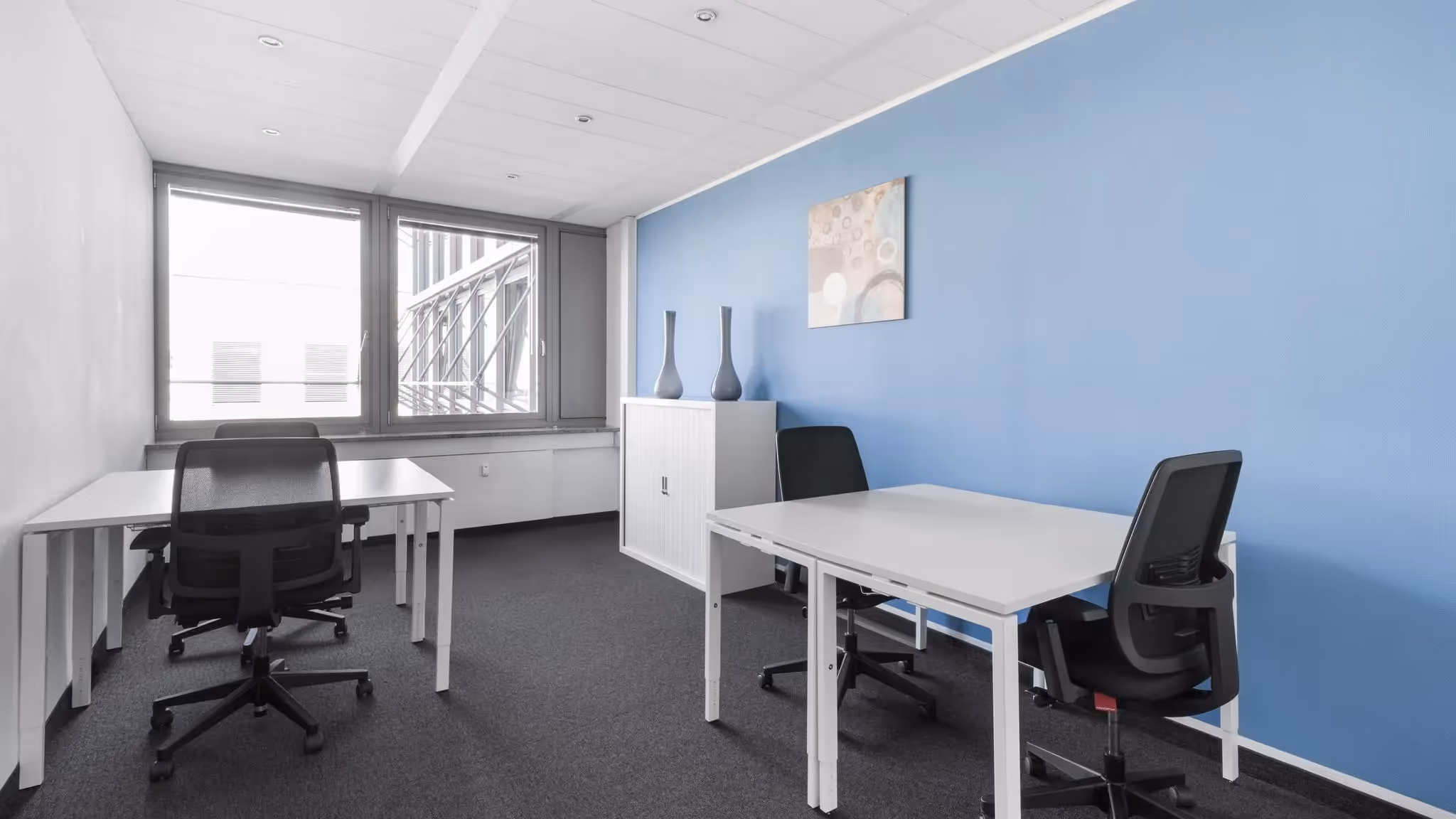 Neumarkt Galerie by Regus — Meetingraum mit flexiblen Arbeitsplätzen und moderner Architektur