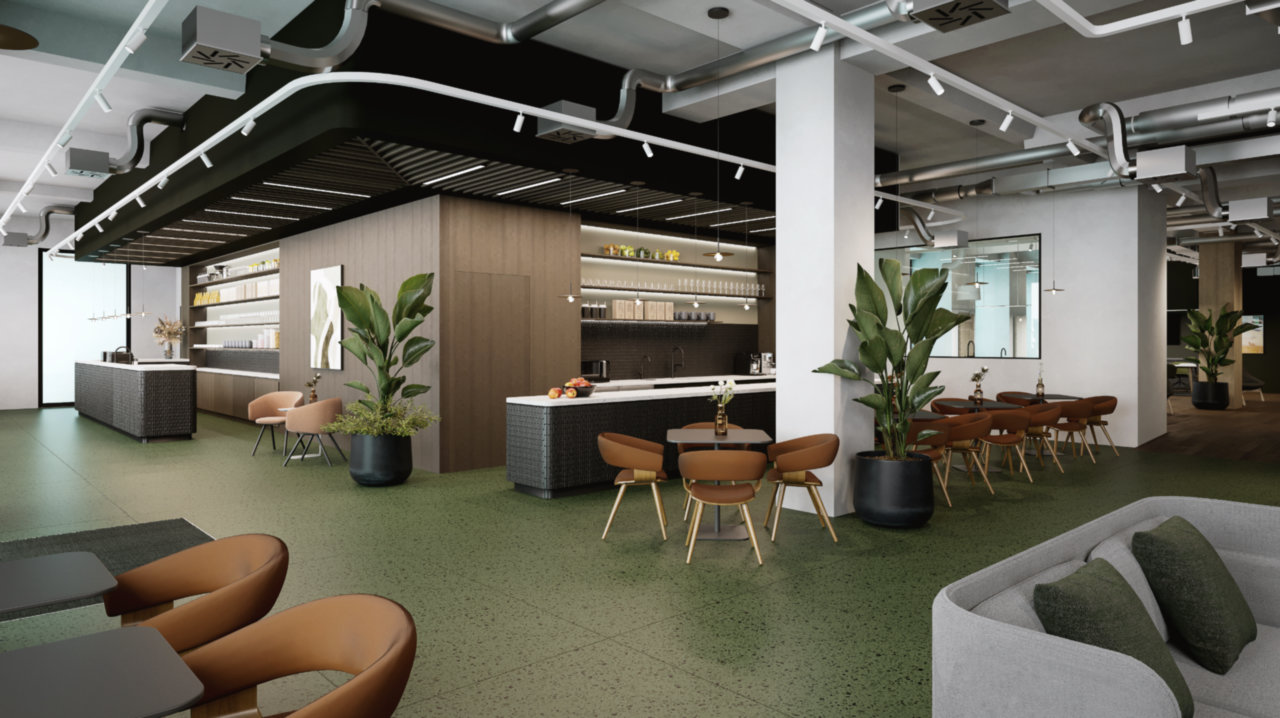 Moderner Coworking-Bereich mit Holzküche, grünen Pflanzen, braunen Stühlen, grauem Sofa und freiliegenden Rohren.