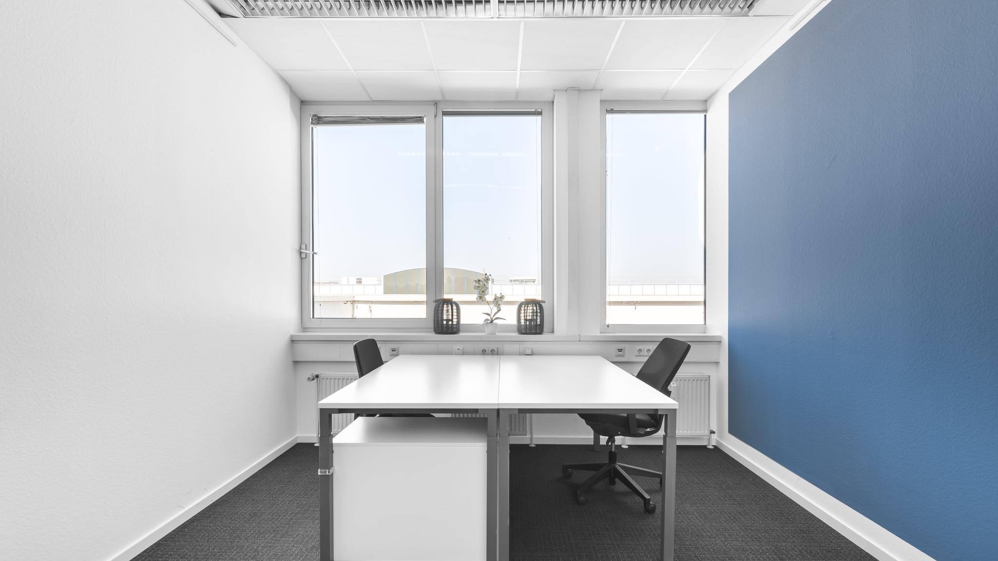 Offisto by HQ — Meetingraum mit flexiblen Arbeitsplätzen und moderner Architektur