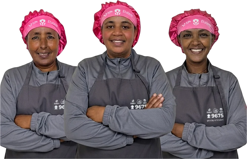 Three Etalem service providers in their uniforms, smiling