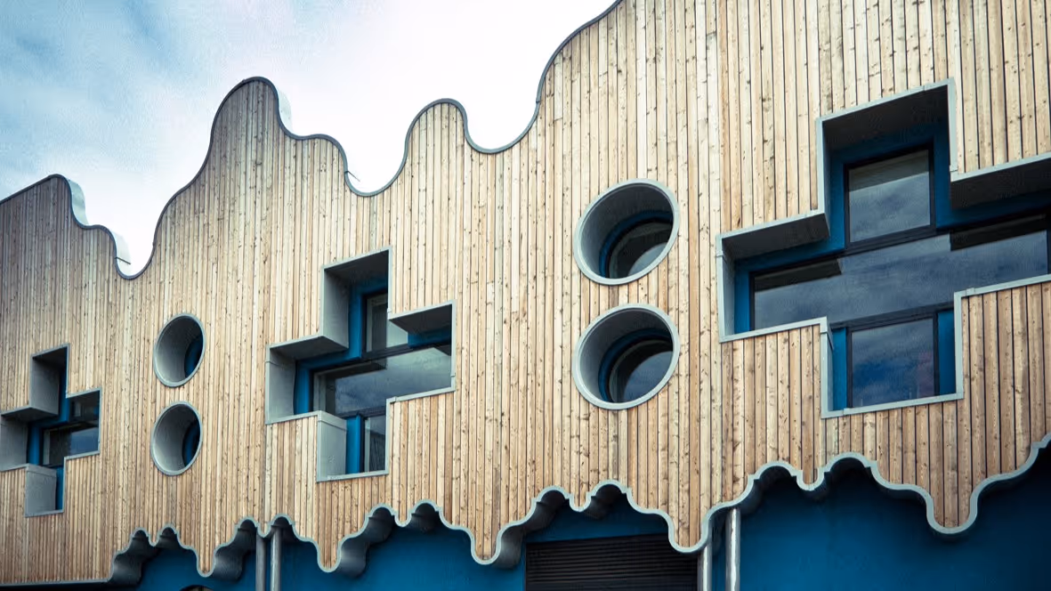 Intricate timber façade of Porth Teigr
