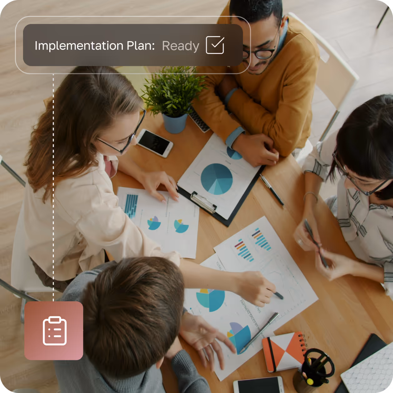 Four people sitting around a wooden table reviewing documents with charts and graphs in a meeting, with a text overlay stating 'Implementation Plan: Ready' and a checklist icon.