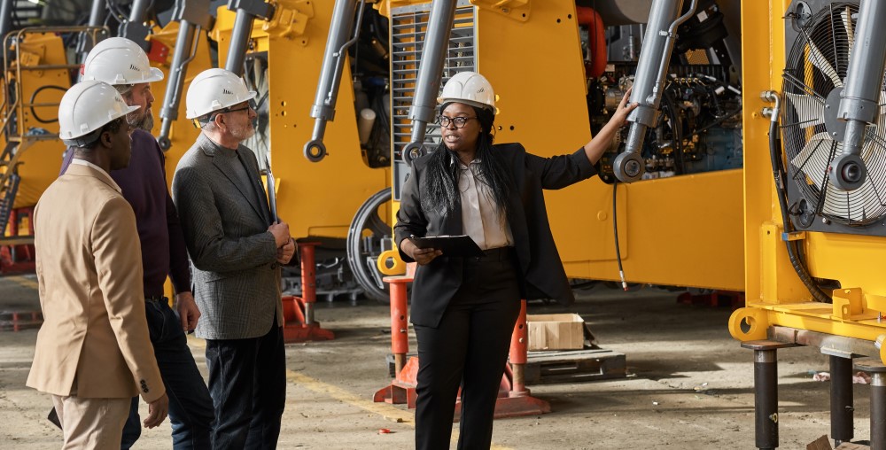 Women inspector reviewing machinery