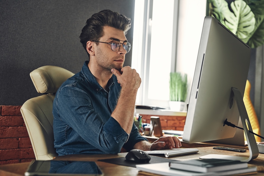 office worker looking at display screen
