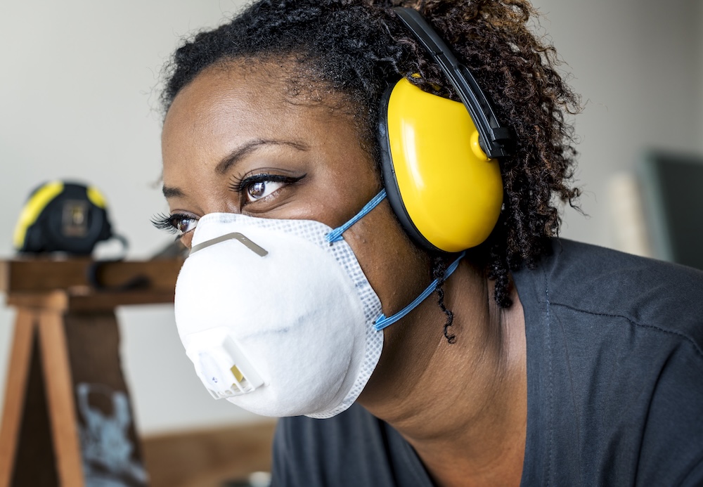 Woman wearing personal protective equipment