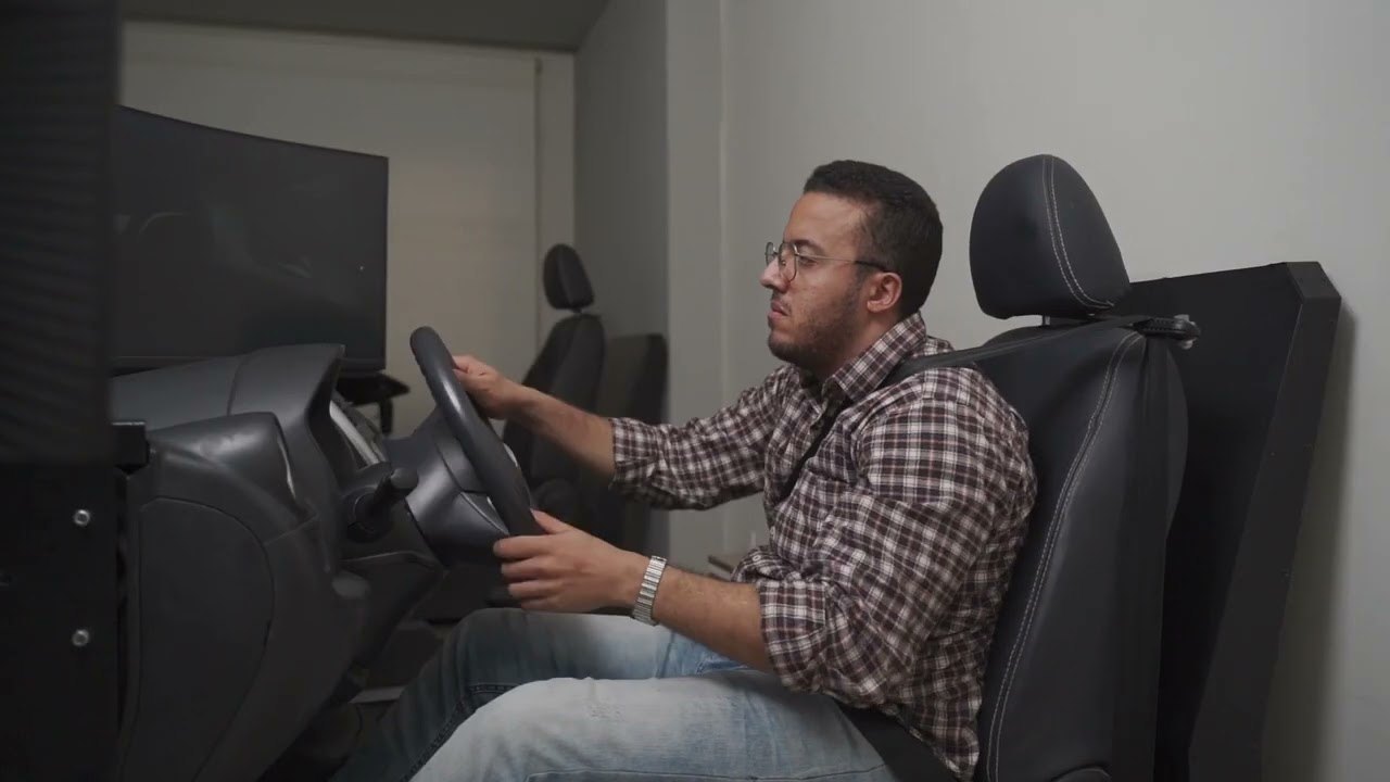 A trainee in a Genesis driving simulator