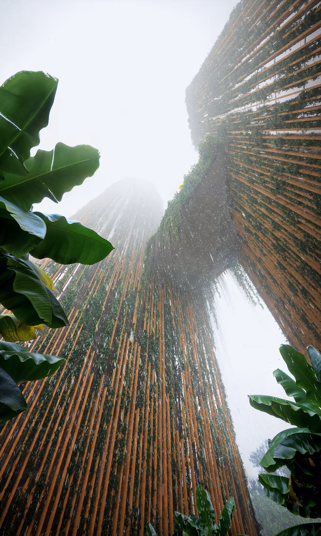 Architectural 3D visualization by HISM of a sustainable tropical high-rise in Manila, Philippines, designed by Ricardo Bofill Taller de Arquitectura — featuring vertical gardens and organic materials for biophilic urban development in Southeast Asia.