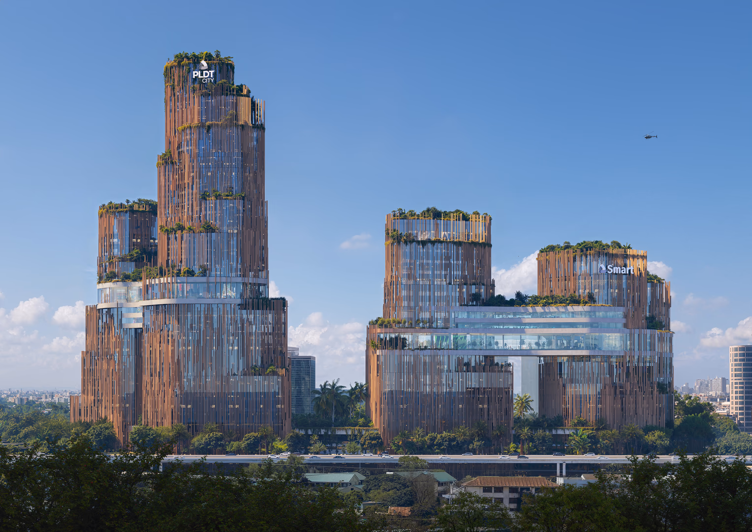 Photorealistic architectural visualization of futuristic skyscrapers featuring vertical gardens, glass facades, and modern sustainable design in an urban skyline — CGI rendering by HISM Studio