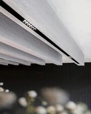 Close-up of Balken Volumetric Baffles' clean linear geometry.