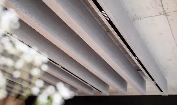 Architectural rhythm created by Balken acoustic baffles in a contemporary space.