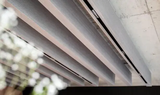 Architectural rhythm created by Balken acoustic baffles in a contemporary space.