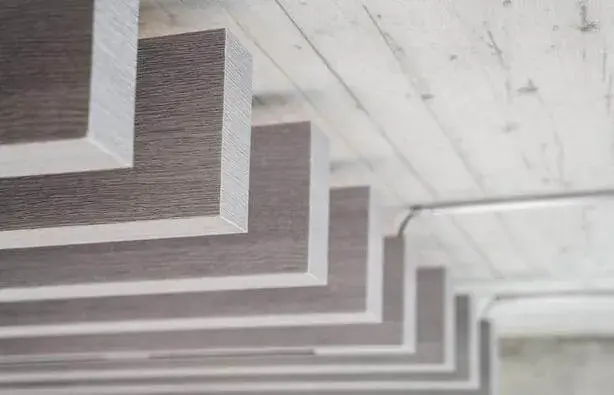 Balken baffles integrating acoustic comfort and design sophistication.