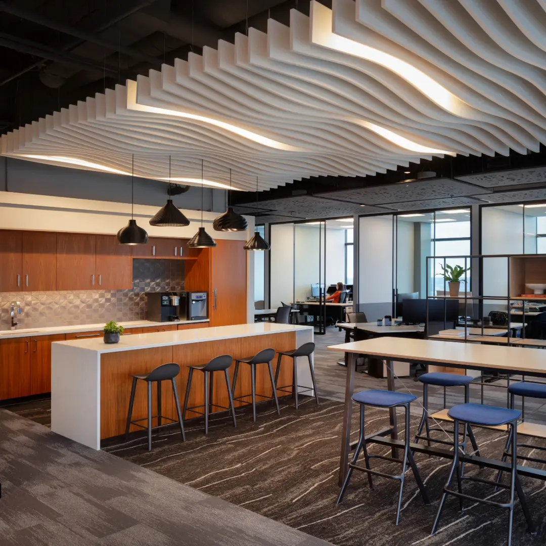 Unique Wave Morph ceiling design in a meeting room.