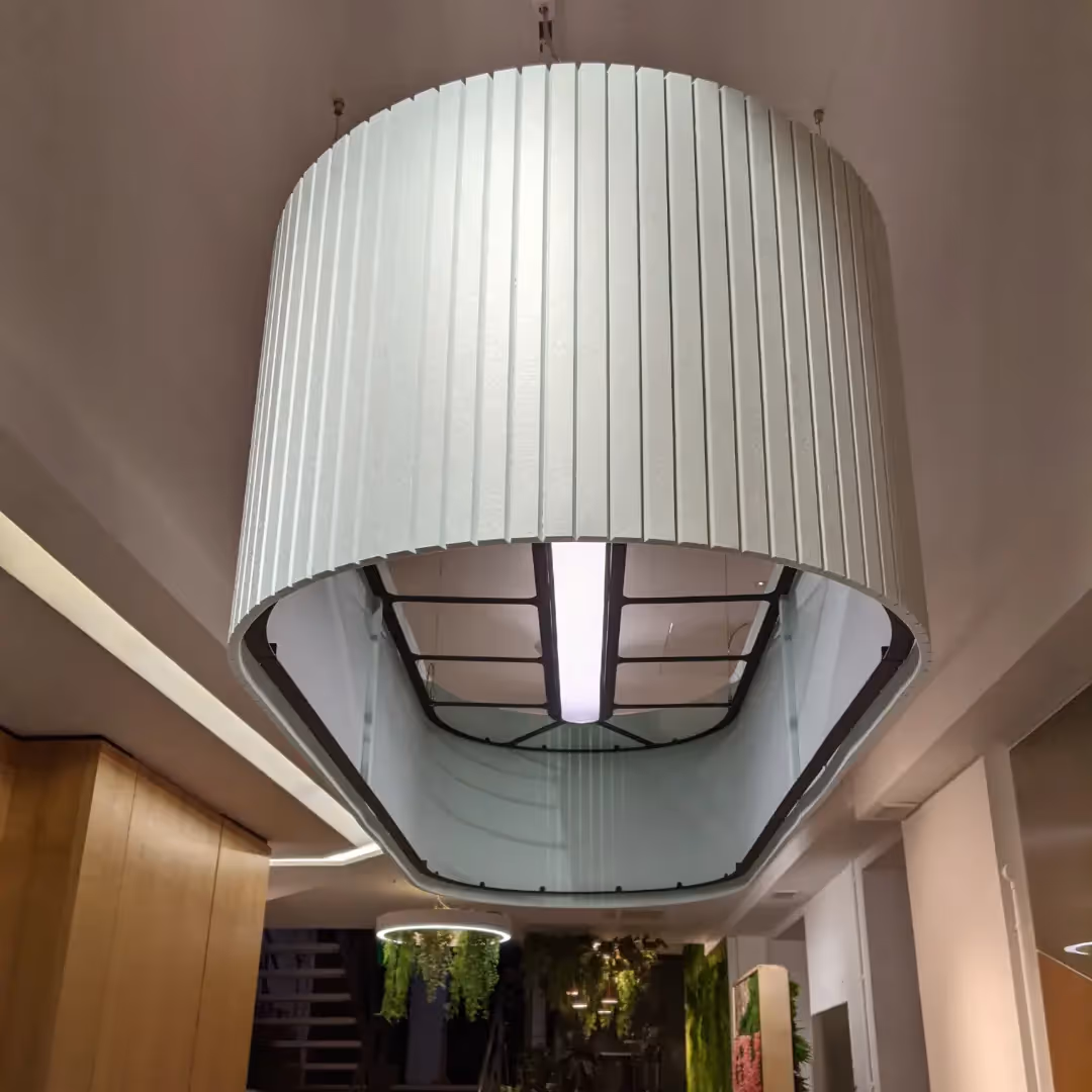 Modern Umbra acoustic lighting in a workspace