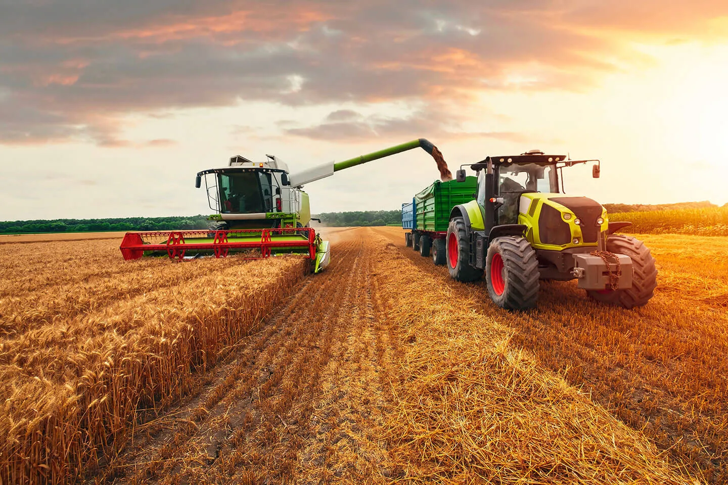 Agricultural equipment with hydraulic systems in action, representing Bailey’s support for the agriculture sector.
