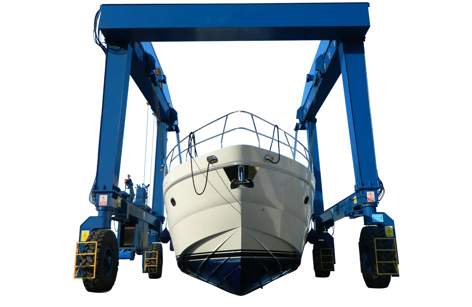Marine travel lift hoisting a boat