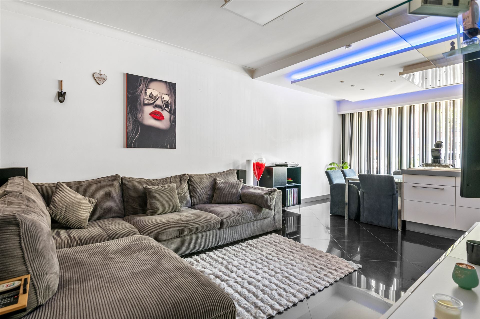 Gezellig gelijkvloers appartement met 3slpks en tuin.