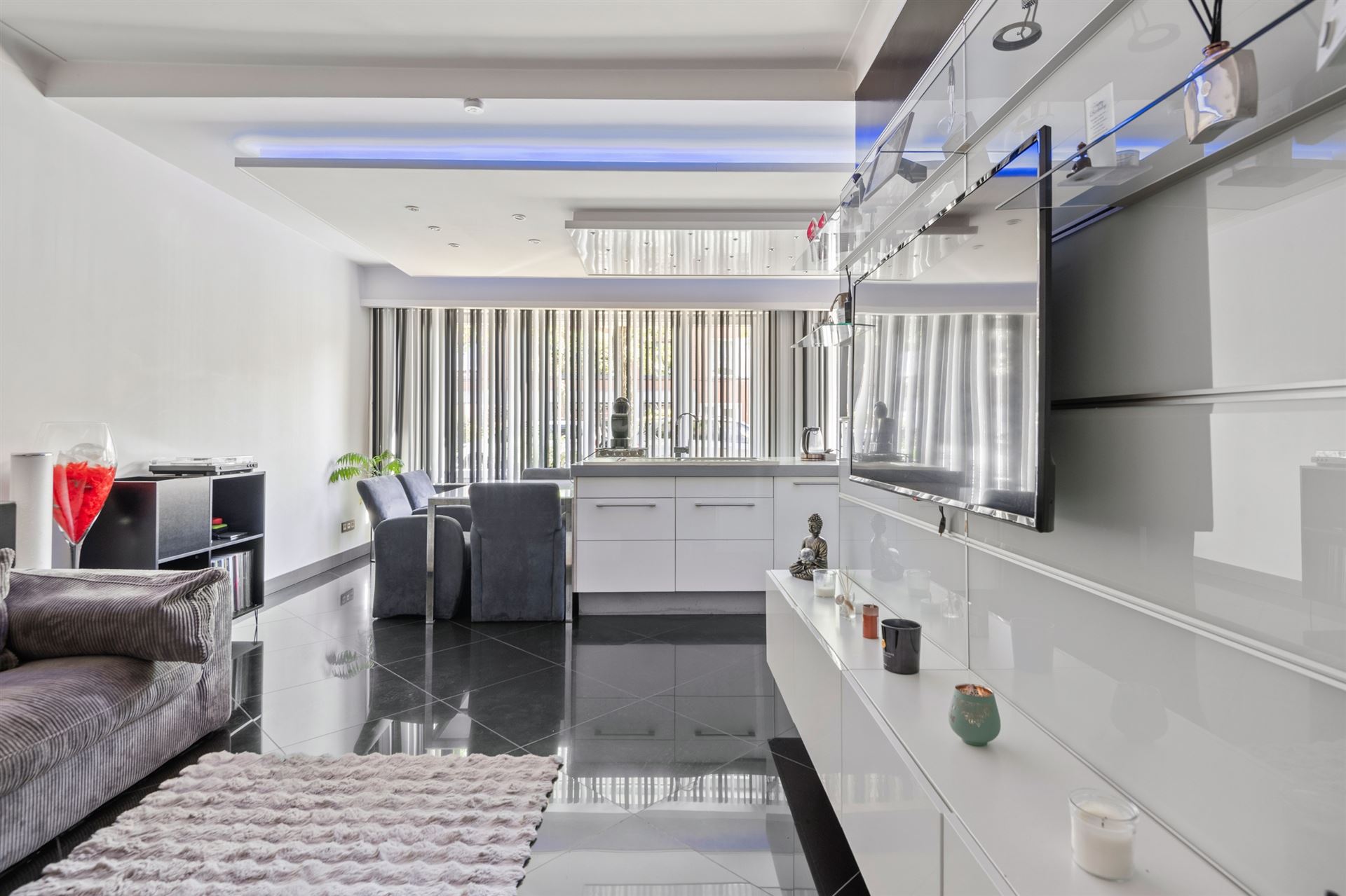 Gezellig gelijkvloers appartement met 3slpks en tuin.