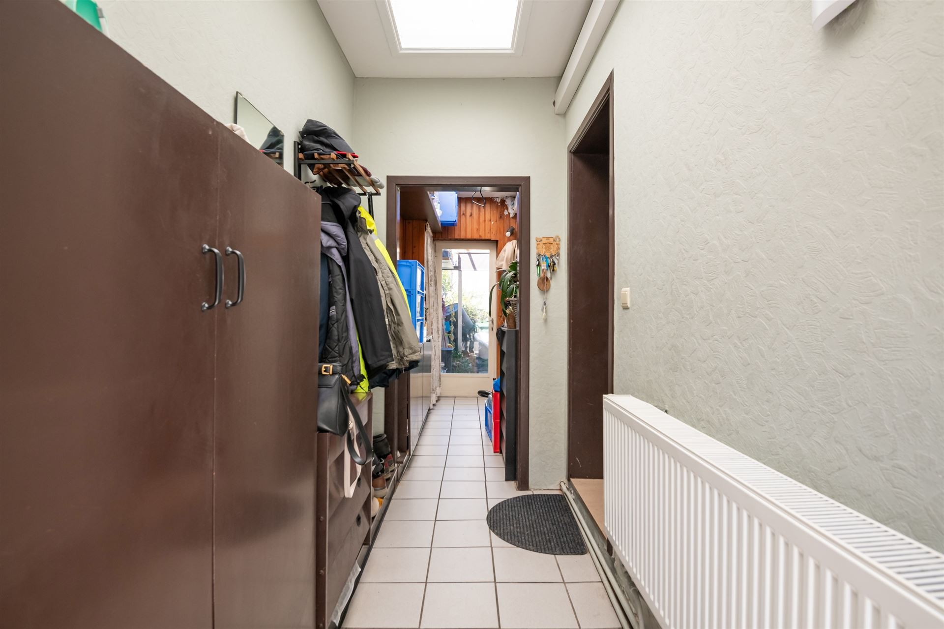 Centraal gelegen gezinswoning met 3 slaapkamers en stadstuin.
