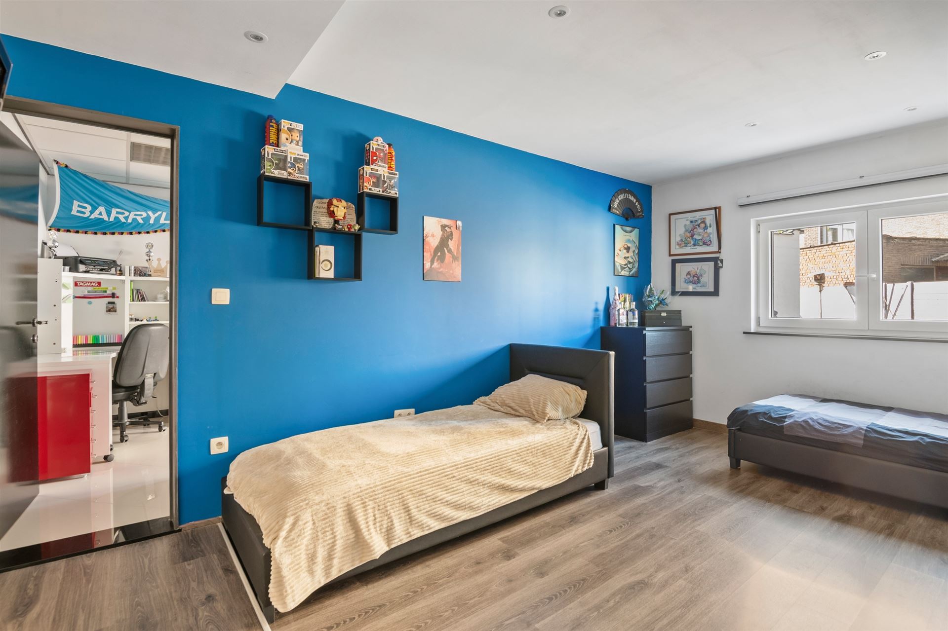 Gezellig gelijkvloers appartement met 3slpks en tuin.